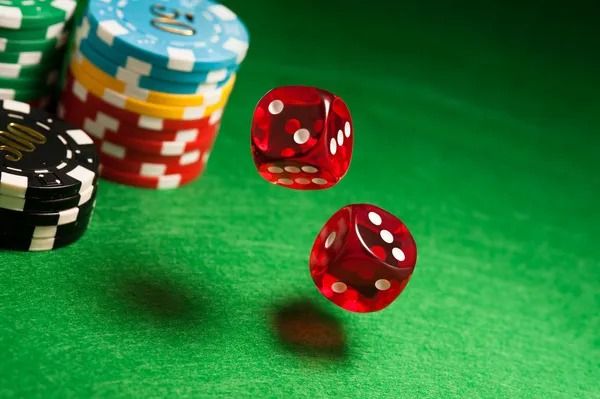 karyabola mobile app interface showing slot games and live casino options